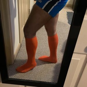 Orange athletic power socks.